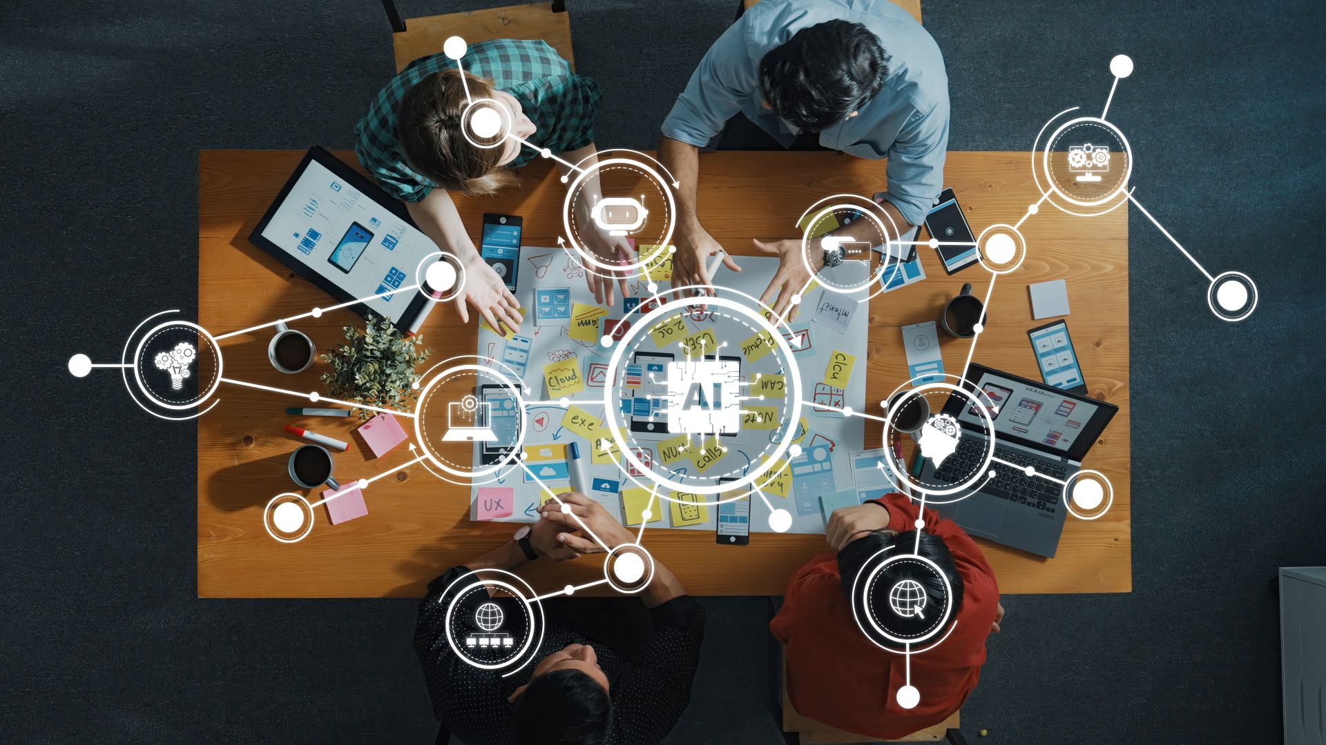 A top-down view of a collaborative team working on AI technology development with digital tools on a wooden table, showcasing creativity and innovation in professional settings. Amity