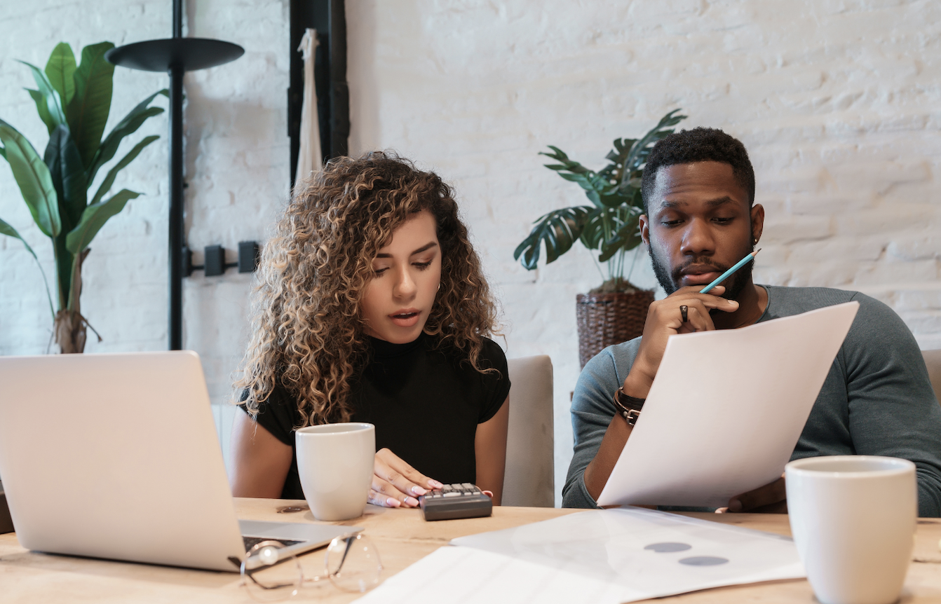 2026 L&D budget planning meeting between stakeholders at a table